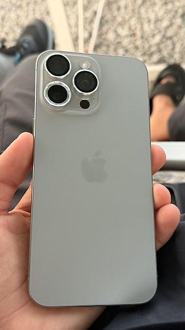 apple 16e: IPhone 15 Pro Max, титановый корпус, цвет светло‑серый. Память 256 ГБ — 1