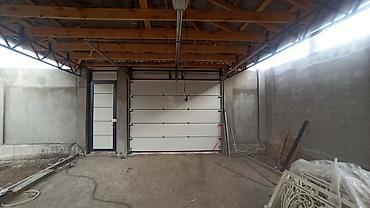 Секционные ворота: Установка секционных ворот – универсальный вариант закрытия проема для — 3