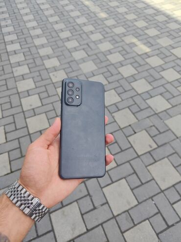 телефон флай ff281: Samsung Galaxy A23, 64 ГБ, цвет - Черный, Отпечаток пальца, Face ID