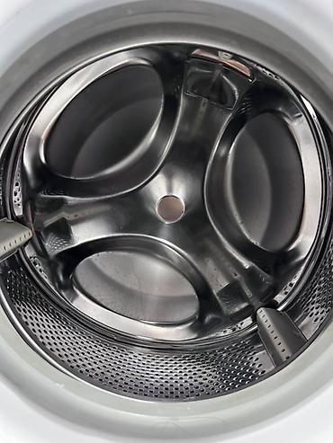 Стиральная машина Indesit, фронтальная загрузка. Характеристики и
