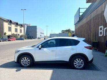 спойлер мазда демио: Mazda CX-5, ağ rəngli kompakt krossover. Əsas xüsusiyyətlər: - Geniş