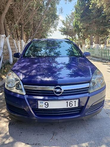 uşaq ucun avtomobil: Opel Astra H Caravan (universal), tünd mavi rəng. - Korpus: 5 qapılı — 1