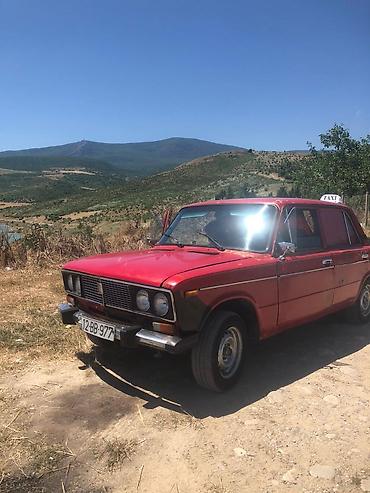 e90 aksesuar: VAZ 2106, qırmızı rəngli, sedan kuzov. Xüsusiyyətlər: - 4 qapı, 5 — 6