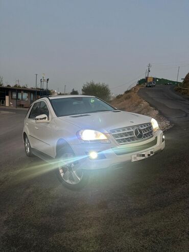 Водный транспорт: Mercedes-Benz M-Class (W164) ağ rəngli SUV Vin-kod
