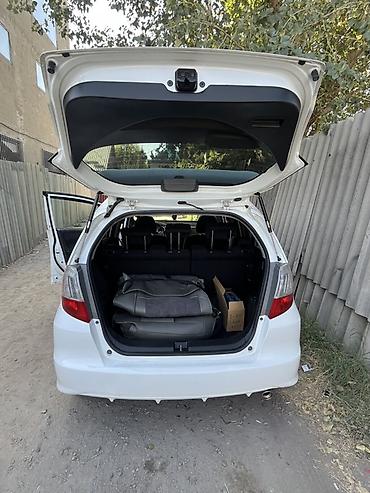 тенир тоо: Honda Fit: 2009 г., 1.5 л, Автомат, Бензин, Хетчбек — 9