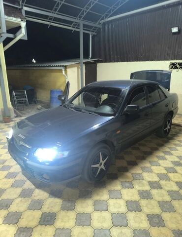 Mazda 626: 1999 г., 1.8 л, Механика, Бензин, Седан
