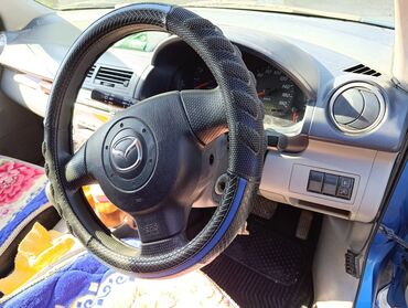 матиз машына: Mazda Demio: 2004 г., 1.5 л, Автоматтык, Бензин, Хетчбек
