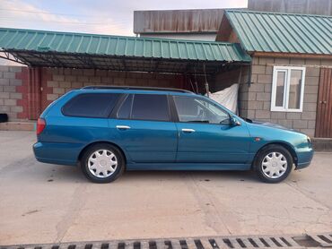 шыны и диски: Nissan Primera: 2001 г., 1.8 л, Механика, Бензин, Универсал