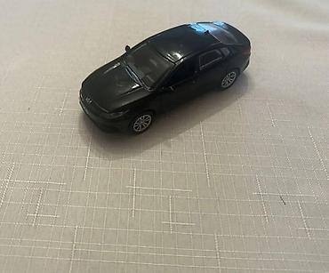 Oyuncaq nəqliyyat: Qara rəngli metal oyuncaq avtomobil – Kia K5 modelinə bənzər sedan — 1