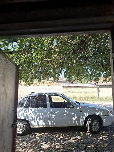 Daewoo: Model: Daewoo Nexia sedan Kuzov: 4 qapılı, ağ rəng Yanacaq: Benzin — 13