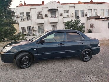 Mitsubishi: Mitsubishi Lancer: 1.3 l | 2006 il 300000 km — 14