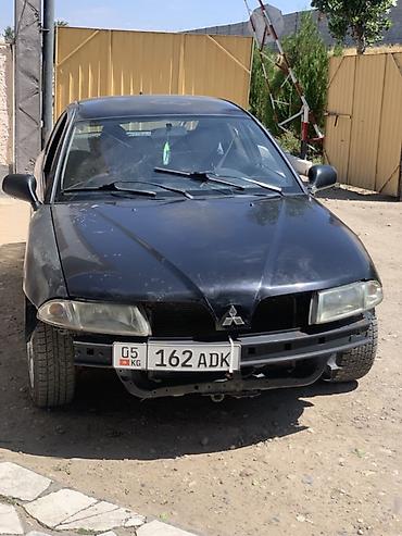 авто толщиномер: Mitsubishi Carisma: 2001 г., Механика, Бензин, Седан — 2