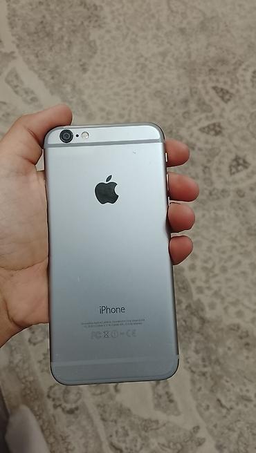 Apple iPhone 6 в цвете Space Gray. На корпусе указана модель A1549