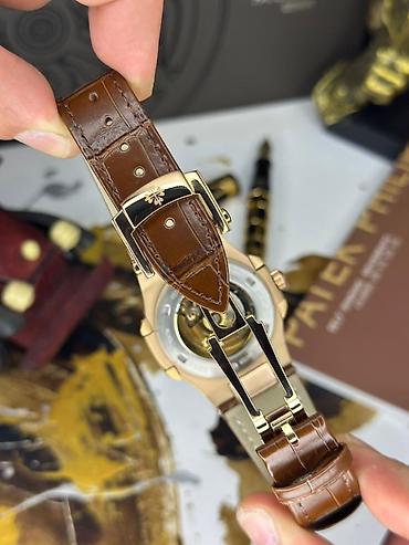 Aksesuarlar: Patek Philippe Nautilus – klassik lüks saat Xüsusiyyətlər: - Korpus — 10