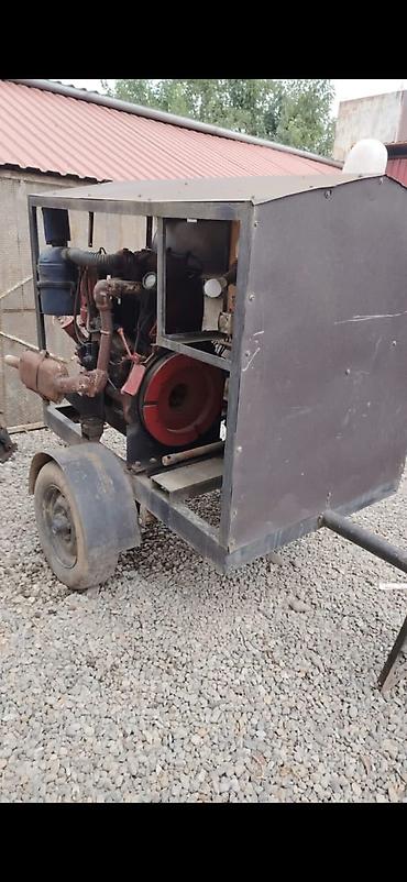 T25 matornan 8 kilovatdiq Generator 3 faza telejkanin belində saz