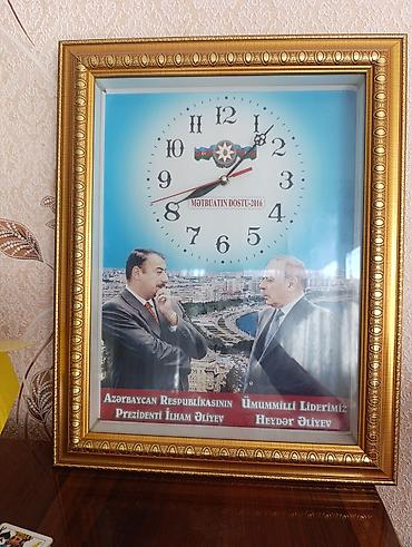 Divar saatı . Yeni 9 azn