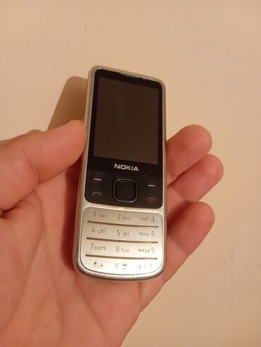 telfon saatlar: Nokia 6700 Slide