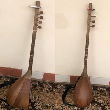 mili saz: Teze qutuda 7 telli saz istifade edilmeyib çanaq tut qolu qoz ağacıdı