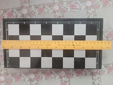 Şahmatlar: Kiçik ölçülü şahmatlardan deyil.Seliqeli istifade olunub.Ağ — 4