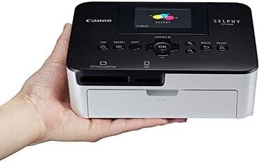 Принтеры: Компактный фото принтер Canon CP1000, + упаковка бумаг и картриджей в