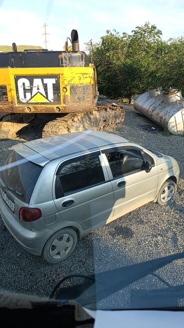 задние фары гольф 3: Daewoo Matiz серебристого цвета. Эта компактная машина отличается