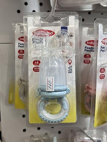 шприц для кормления: Пищевой прорезыватель-пустышка Babyland - Назначение: безопасное — 1