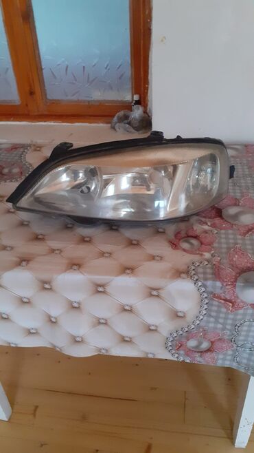 Faralar: Sol, Yaxın və uzaq vuran işıqlar Opel — 11