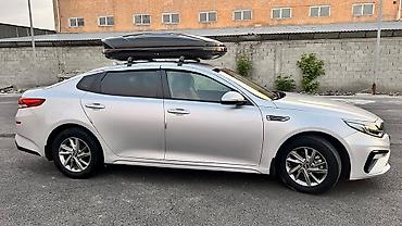 Другие детали салона: Kia К5 - Просторный салон с кожаной отделкой, задний диван на 3 места — 6