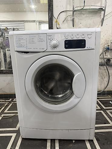 honor rt: Стиральная машина Indesit IWD 6105 (фронтальная загрузка) - Загрузка — 1