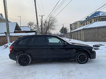 Mazda: Mazda 323: 2000 г., 1.8 л, Механика, Бензин, Универсал — 5