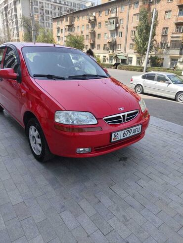 шевроле камаро цена: Красный хэтчбек Daewoo Aveo, отличающийся компактными размерами и