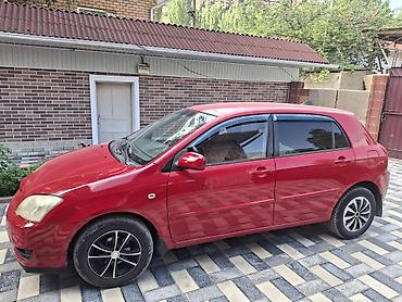 рул: Toyota Corolla: 2006 г., Автомат, Бензин, Хетчбек — 7