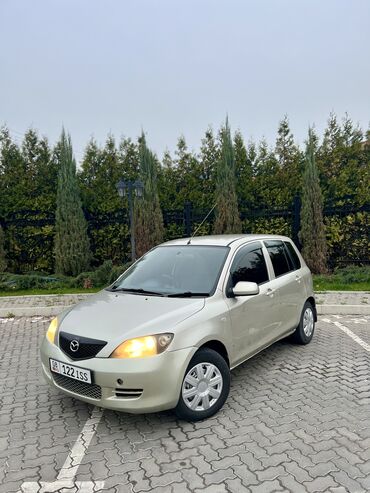 Mazda Demio: 2003 г., 1.5 л, Автомат, Бензин, Хэтчбэк