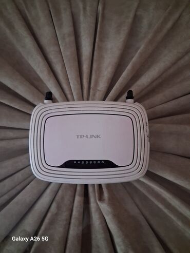 internet modem: Tp link TL-WR841N 2 antenna si usag qirib Sarj verilmir pulnan (1