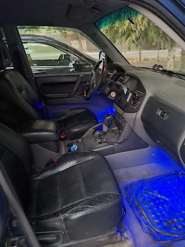 митсубиси пини: Mitsubishi Pajero: 2001 г., Автомат, Внедорожник — 4