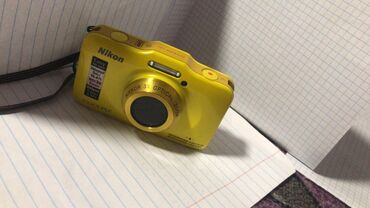 фотографы: Яркая и прочная цифровая фотокамера Nikon Coolpix S32 в желтом