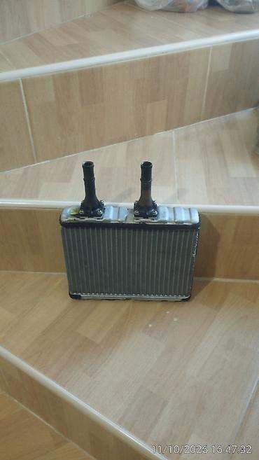 rolik satisi: Nissan üçün müxtəlif ehtiyyat hissələri satılır - peçin radiatoru — 1