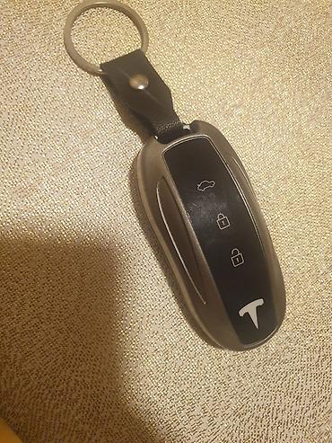 yan güzgülər s: Tesla avtomobilləri üçün smart açar fobu сам купил за 3 прадаю за 2 — 1