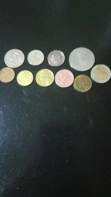 gumuș: Müxtəlif ölkələrdən yığılmış metal pul kolleksiyası - Fotoşəkillərdə — 2