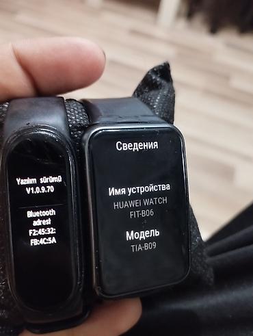 Saat dəstləri: Huawei TIA-B09 Biri Isə Xiomi Mi Band-4 du Her ikiside Orginal Saatdi — 5