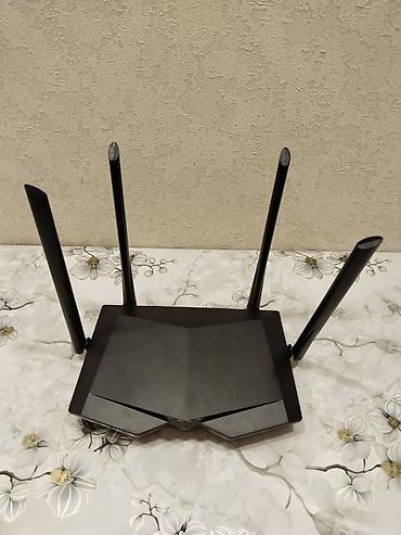 internet mini modem: İki diapazonlu Wi‑Fi router Xüsusiyyətlər: - 4 ədəd xarici antena – — 2