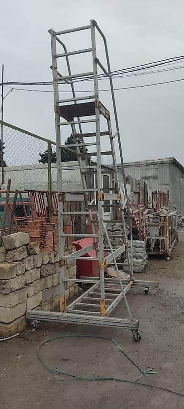 lesa icarəsi: Строительные леса —scaffold-demir ayaqaltilar tikintide — 6