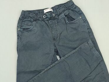 jeansy z zamkami: Spodnie jeansowe, 10 lat, 140, stan - Dobry