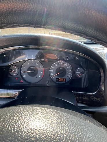 masin cip: Nissan Sunny: 1.6 l | 2008 il Sedan — 9