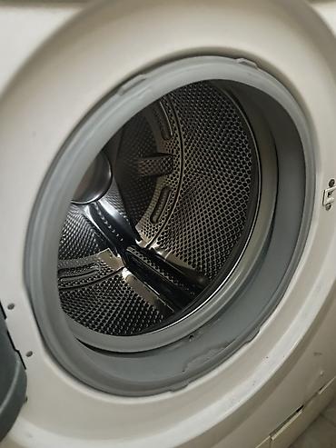 Beko önyükləməli paltaryuyan maşın - AA Class enerji səmərəliliyi -