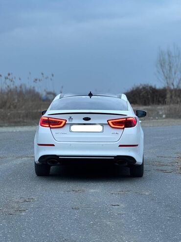 автомобиль: Kia Optima: 2 л | 2015 г. Седан