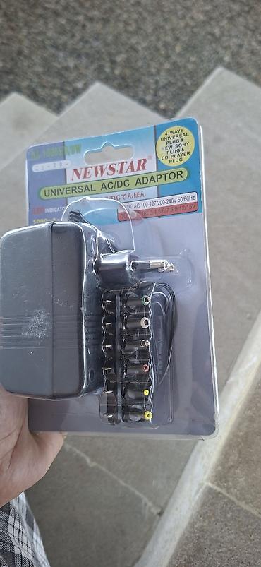 3v adapter: NEWSTAR Universal AC/DC Adapter – NA-1000S/R/BW - Giriş: AC 220–240V — 2