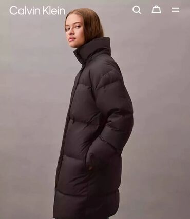 бюстгальтер с широким поясом: Женский пуховик 
Calvin Klein
Размер L (на 48) 
Не подошел по размеру