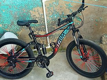 Dağ velosipedləri: STRIM dağ velosipedi - Model: STRIM XC650 (gövdə üzərində qeyd) - — 1
