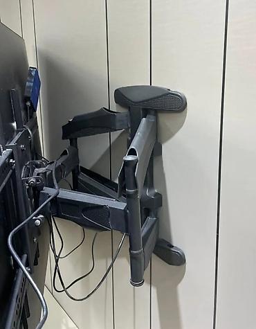 Установка телевизоров: Кронштейн для телевизора поворотно-наклонный от32до65дюймов двурукий — 4